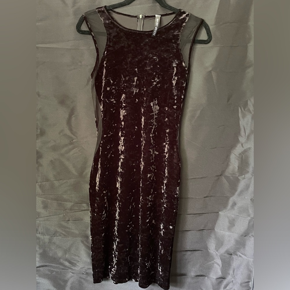 Design Lab black velvet Size L dress. Sheer at sides of dress and by shoulders.